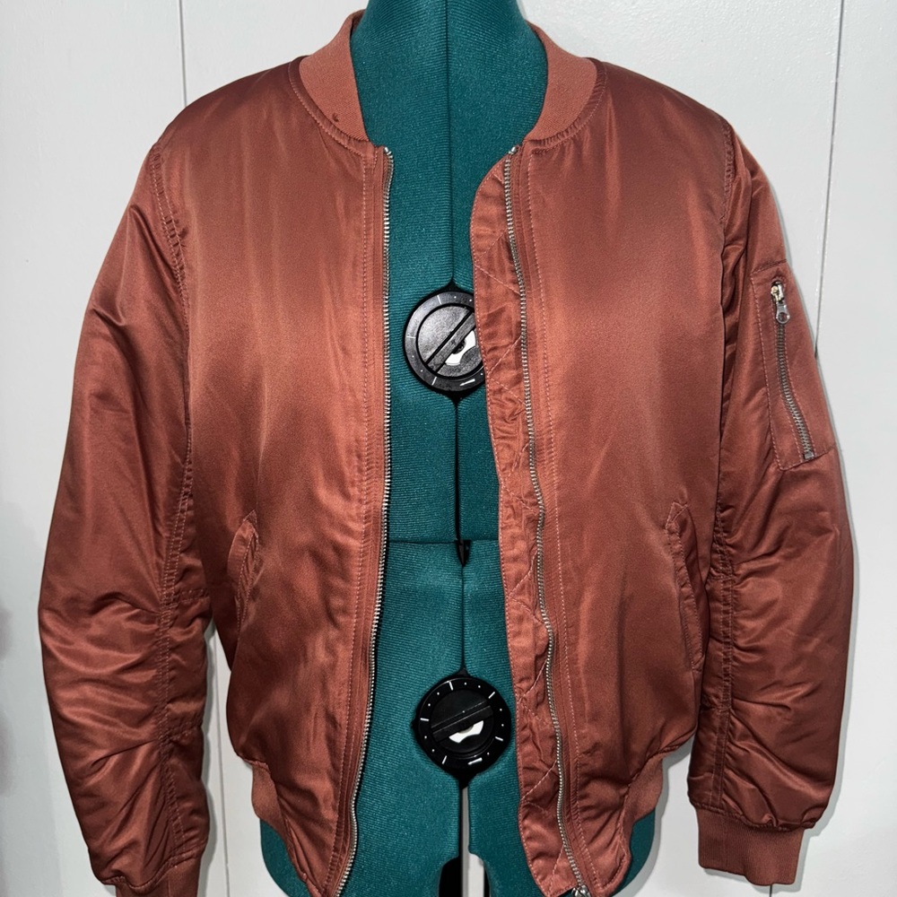 Woman’s rose gold Bomber Jacket
